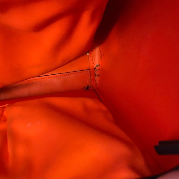 Tory Burch zip up Robinson navy blue tote with orange interior. - Picture 4 of 11